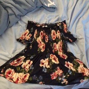 Stretchy flow off the shoulder shirt